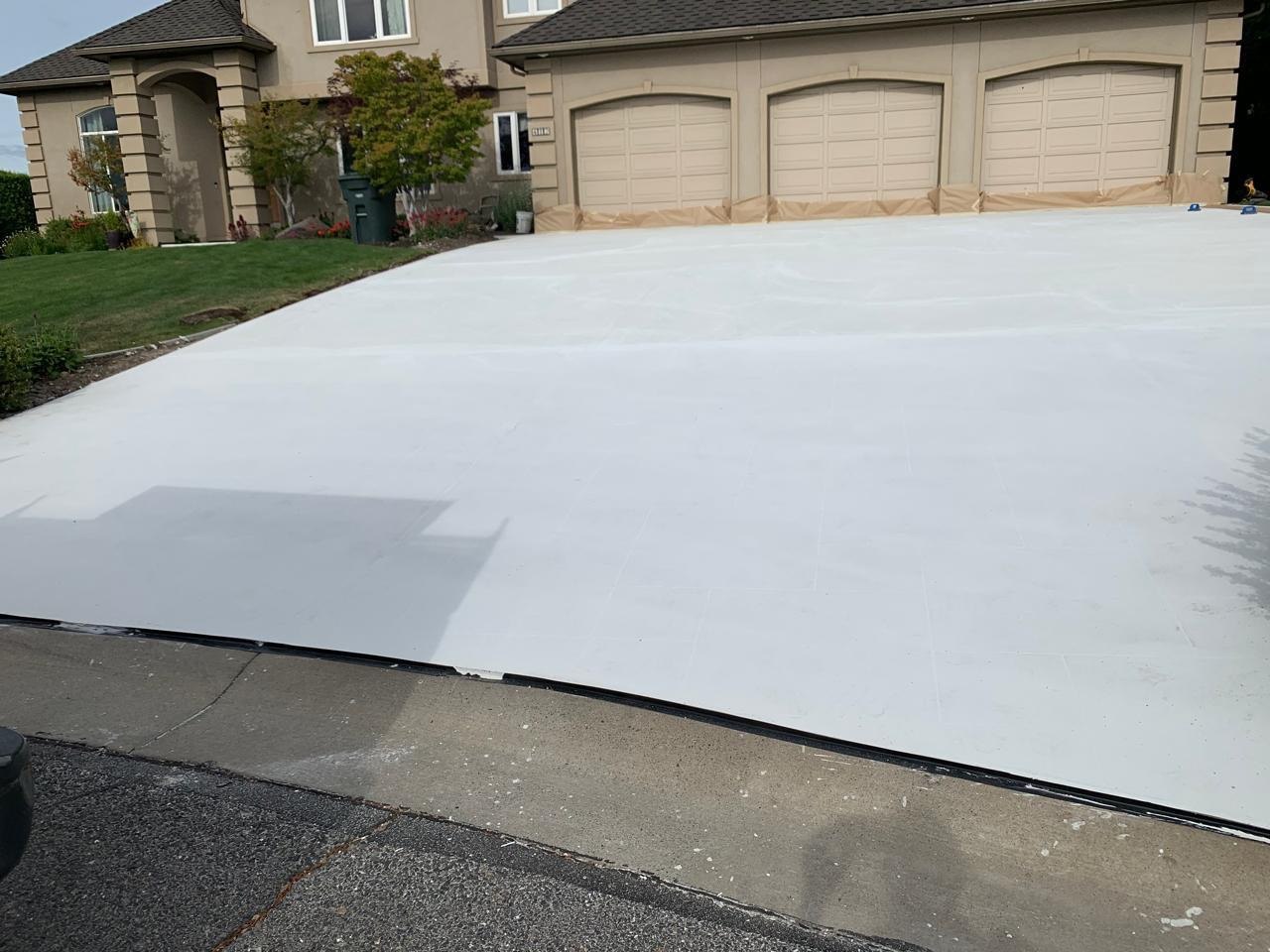 Thin finish driveway resurface